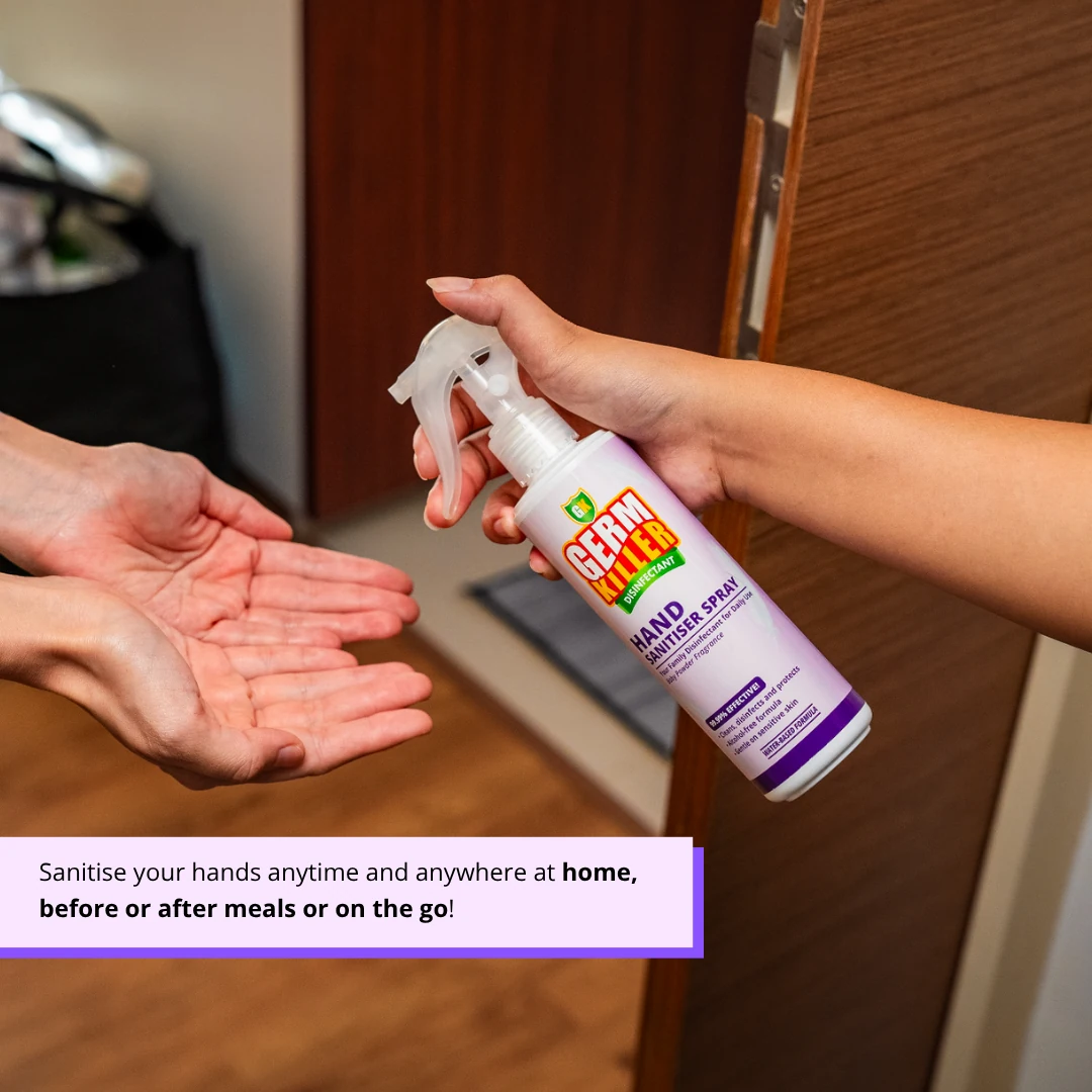 GK Hand Sanitiser spray used on open hands